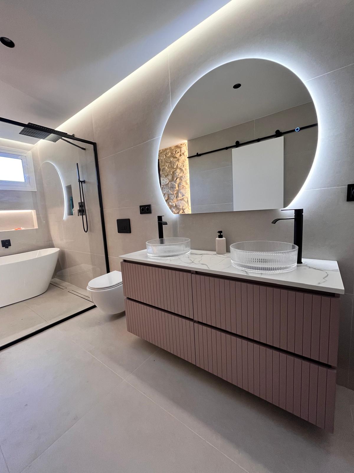 Reforma de baño mueble rosa_Tejero